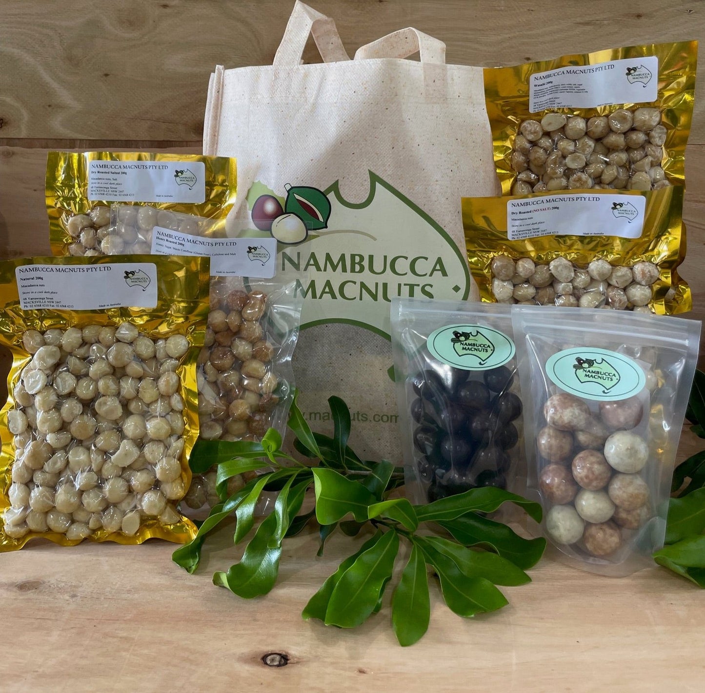 Gourmet Macadamia Nut Indulgence Hamper with five types of raw and falvoured nuts plus two types of chocolate coated nuts