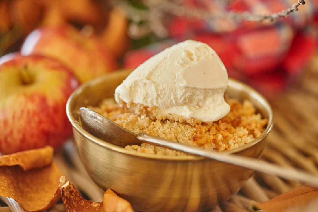 Macadamia crumble topped with vanilla ice cream
