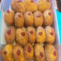 Rainbow Vallery are always at the local markets, and they always take delicious little balls of dough stuffed with their own jam. The perfect doughnt - Macnuts